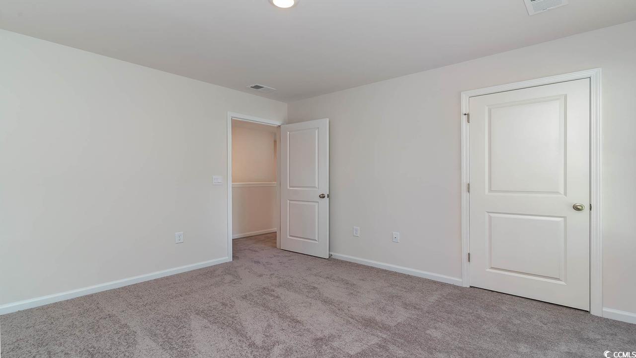 322 Acosta Circle Conway, SC 29527 - Photo 26 of 27 Spare room with light colored carpet
