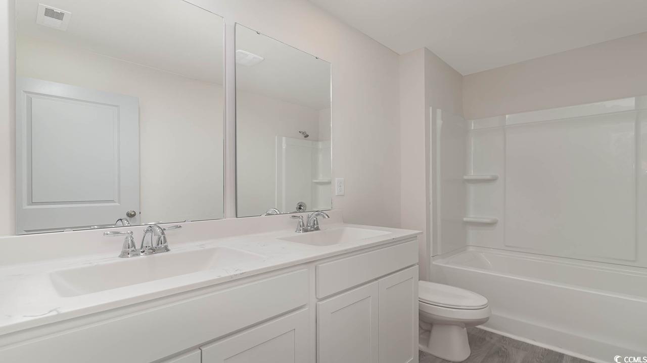 322 Acosta Circle Conway, SC 29527 - Photo 27 of 27 Full bathroom with tub / shower combination, hardw