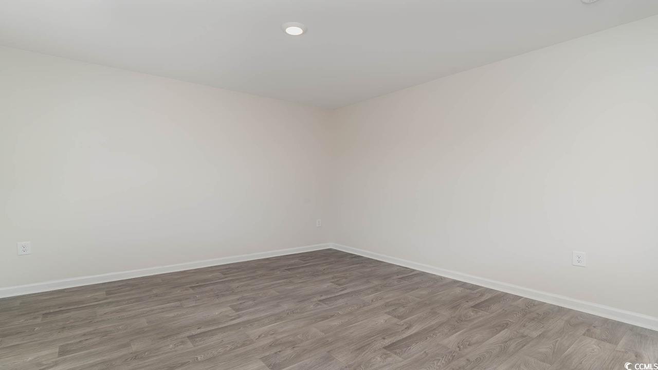 322 Acosta Circle Conway, SC 29527 - Photo 3 of 27 Empty room with wood-type flooring