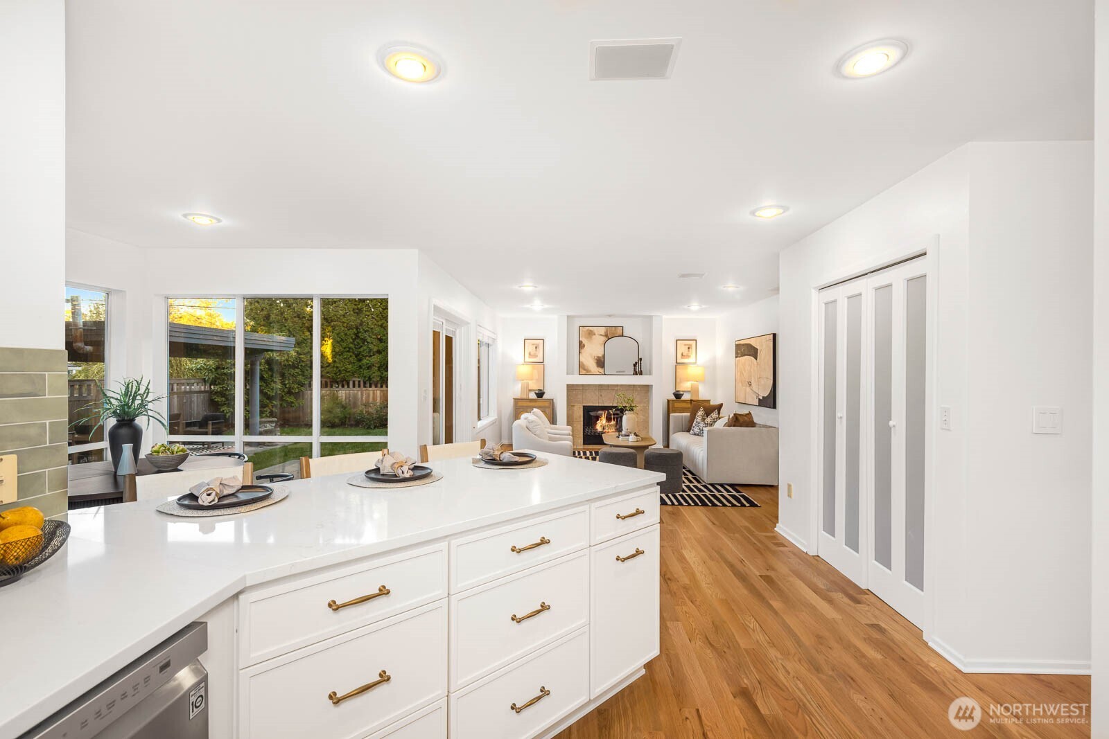 4922 Southwest Hudson Street Seattle, WA 98116 - Photo 14 of 37 a kitchen with sink refrigerator and large window