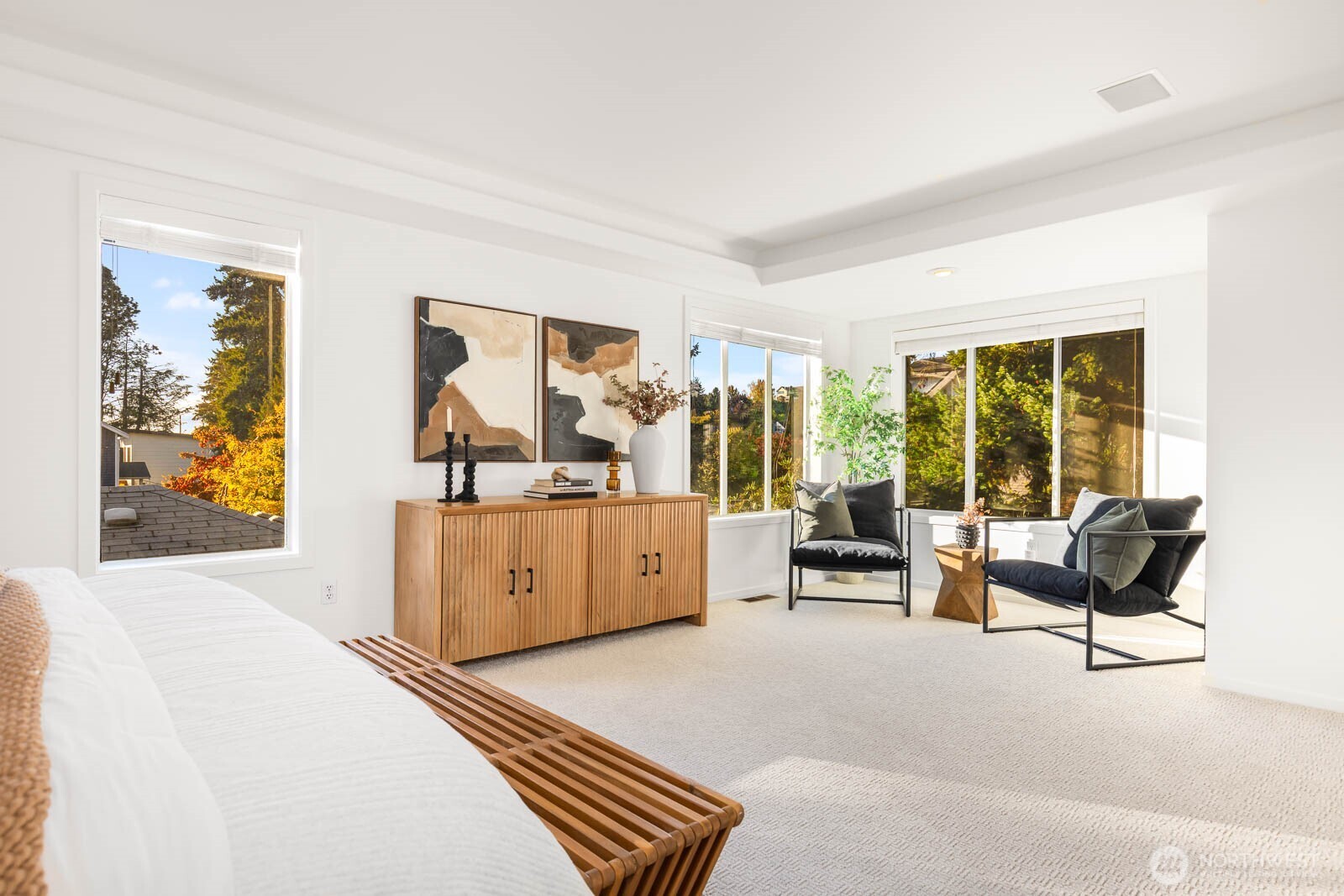 4922 Southwest Hudson Street Seattle, WA 98116 - Photo 21 of 37 a living room with furniture and large windows