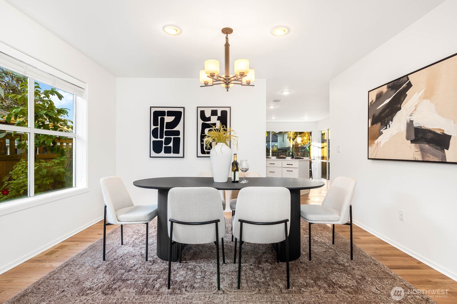 4922 Southwest Hudson Street Seattle, WA 98116 - Photo 7 of 37 a view of a dining room with furniture window and outside view