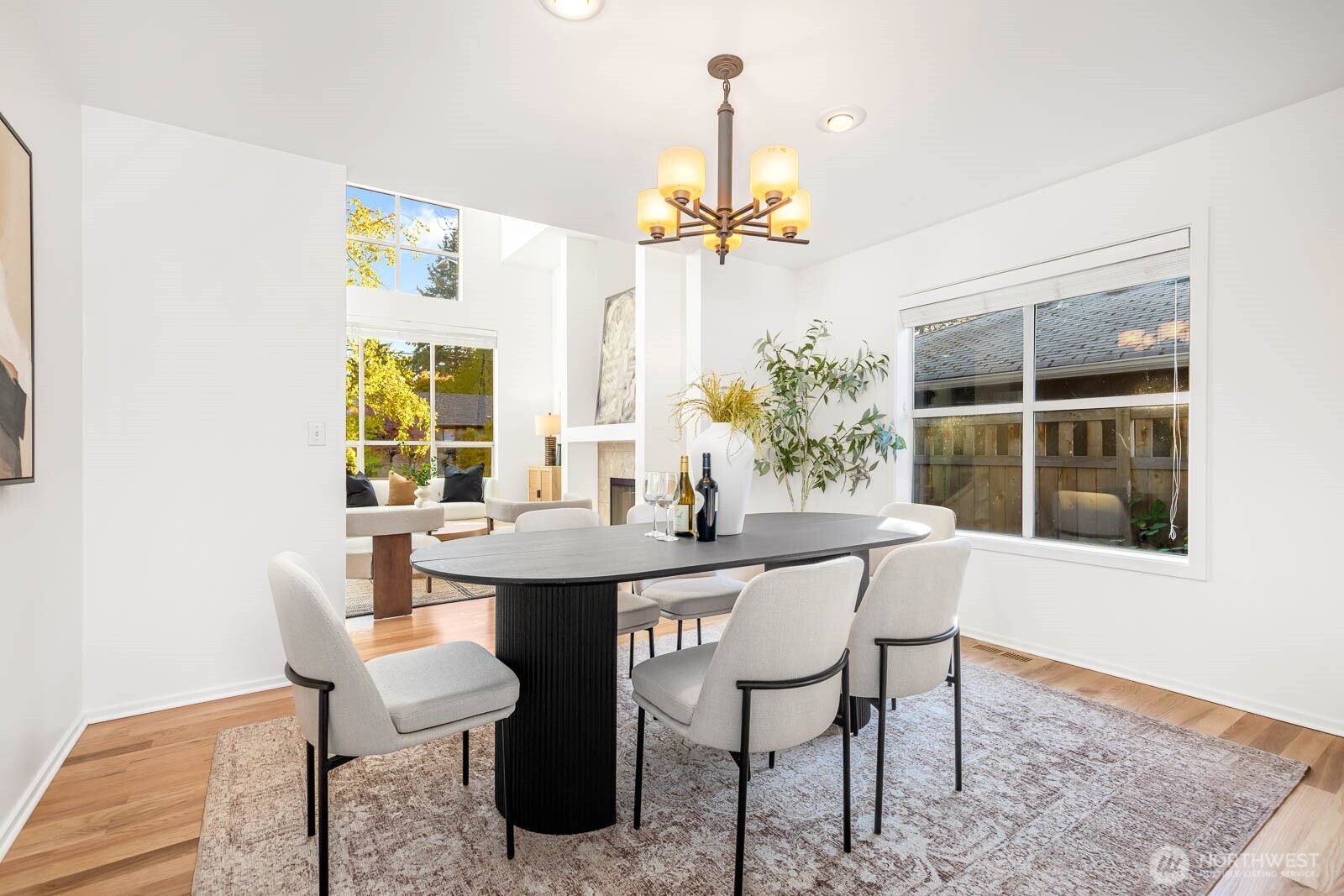 4922 Southwest Hudson Street Seattle, WA 98116 - Photo 8 of 37 a view of a dining room with furniture window and outside view
