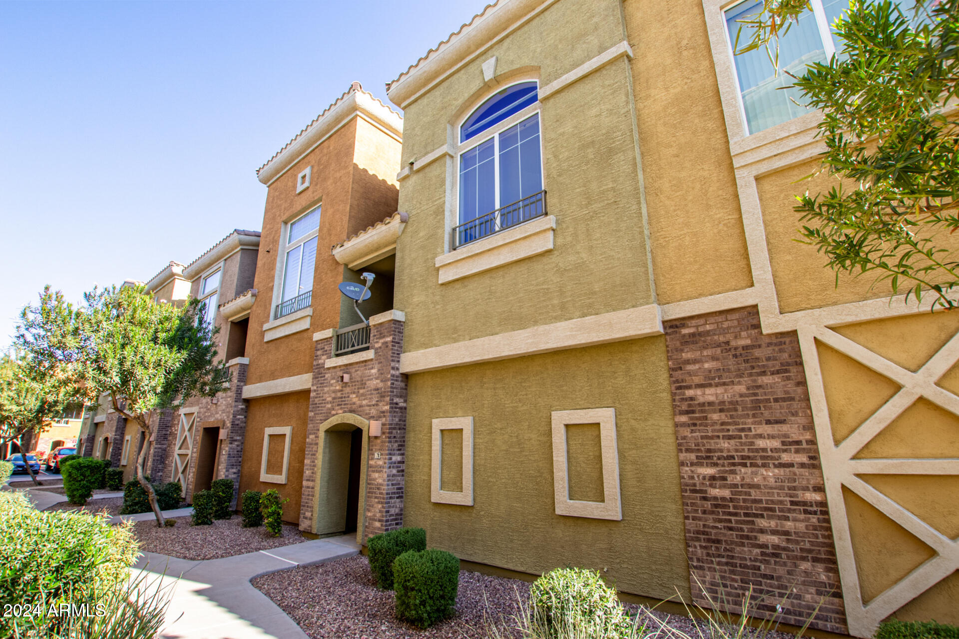 a front view of a multi story residential apartment building