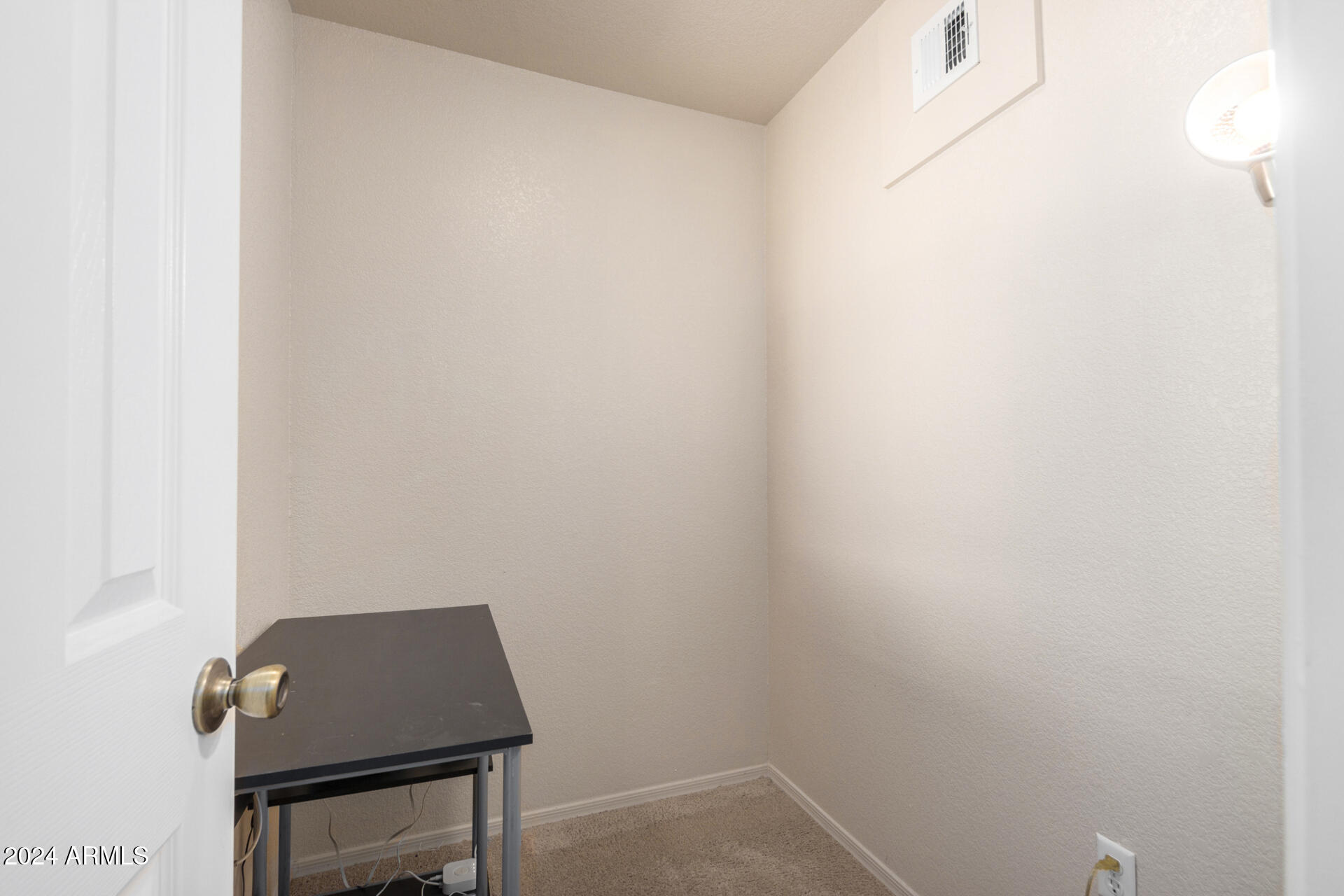 18250 North Cave Creek Road, Unit 163 Phoenix, AZ 85032 - Photo 21 of 32 a room with a table and a chair