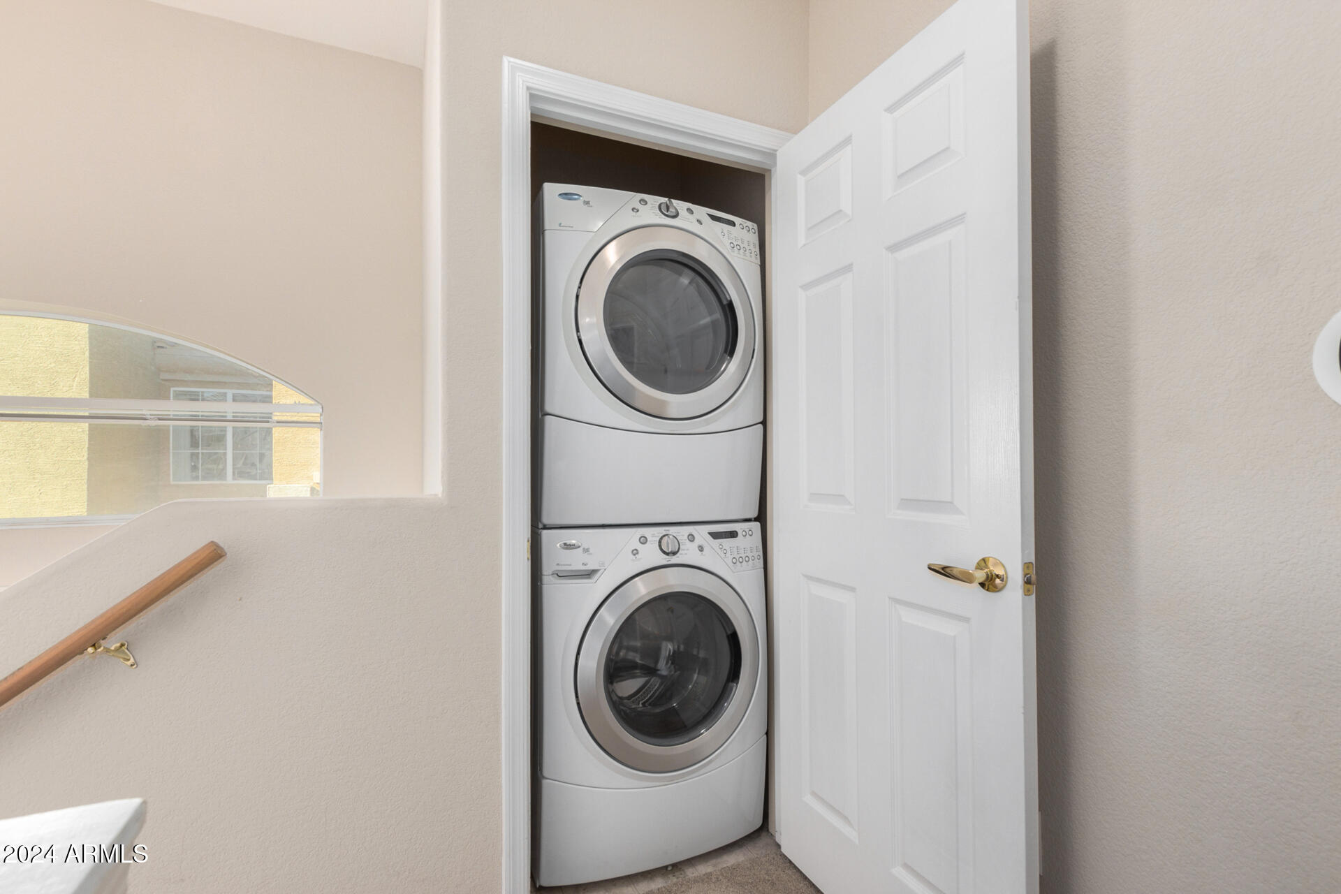 18250 North Cave Creek Road, Unit 163 Phoenix, AZ 85032 - Photo 22 of 32 a utility room with dryer and washer