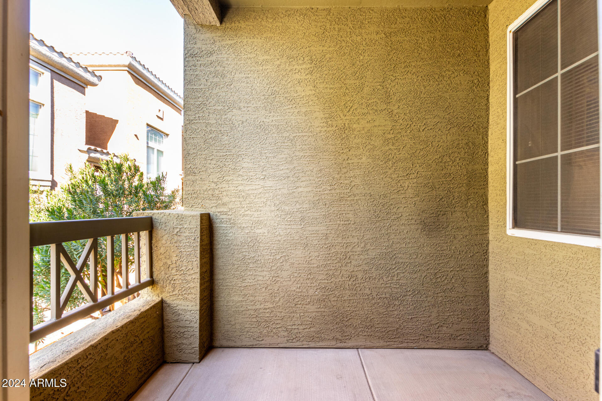 18250 North Cave Creek Road, Unit 163 Phoenix, AZ 85032 - Photo 25 of 32 a view of a balcony with wooden floor