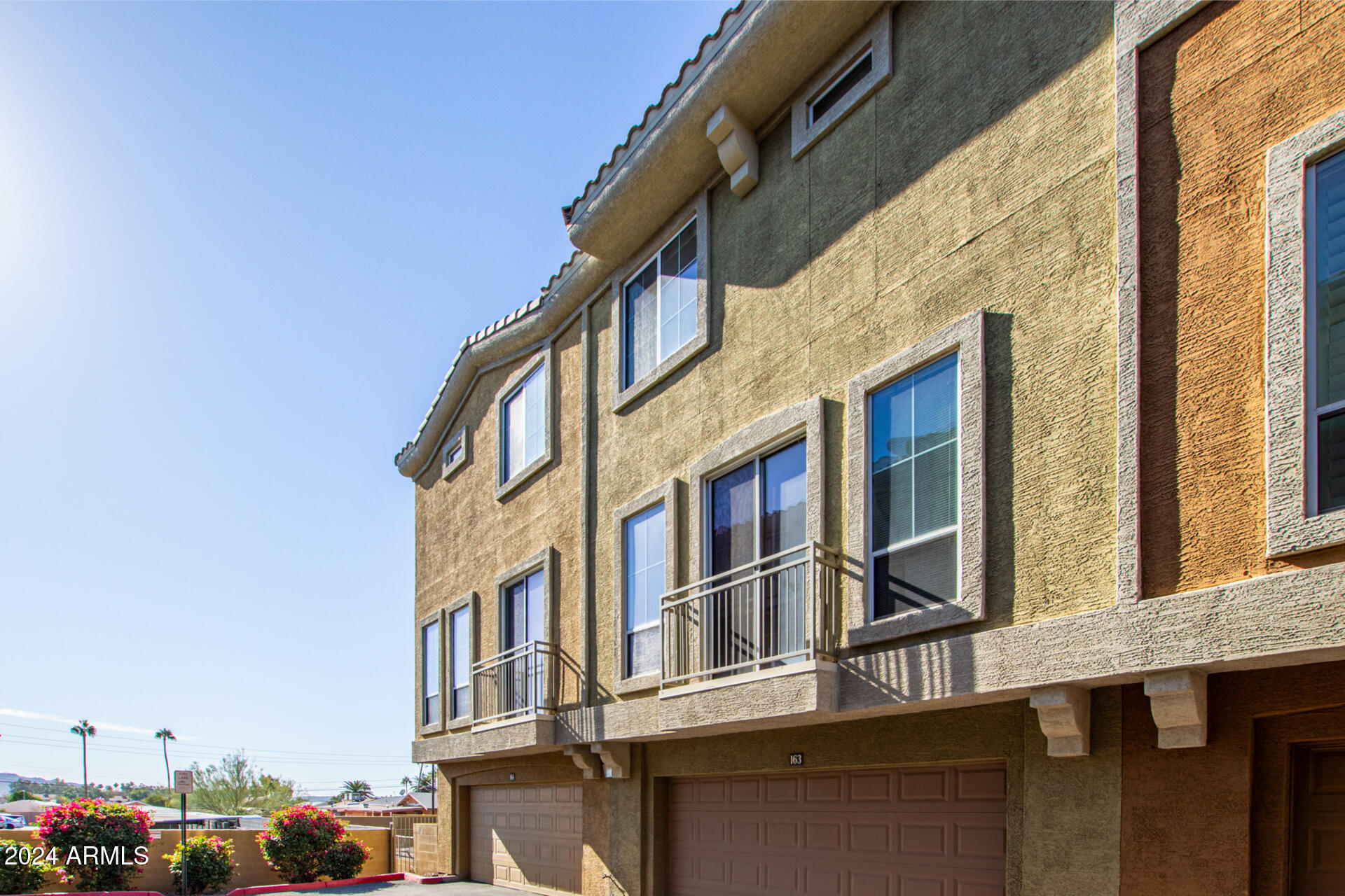 18250 North Cave Creek Road, Unit 163 Phoenix, AZ 85032 - Photo 27 of 32 a view of buildings and street