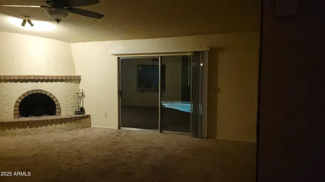 a view of livingroom with washer and dryer