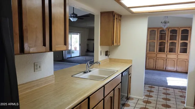 a bathroom with a sink a vanity and a mirror