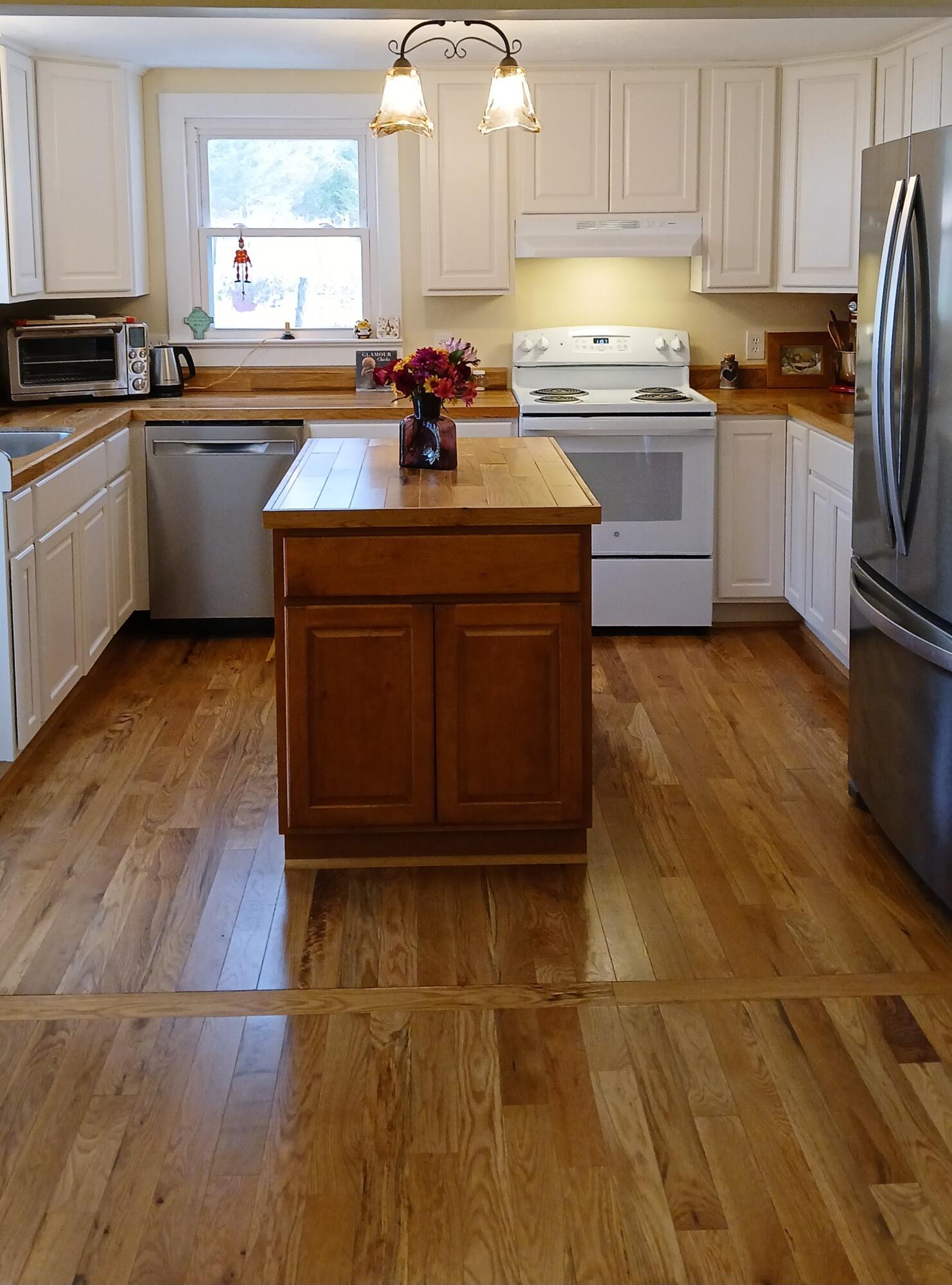 5110 Rich Patch Road Covington, VA 24426 - Photo 11 of 25 a kitchen with kitchen island granite countertop a sink cabinets and stainless steel appliances