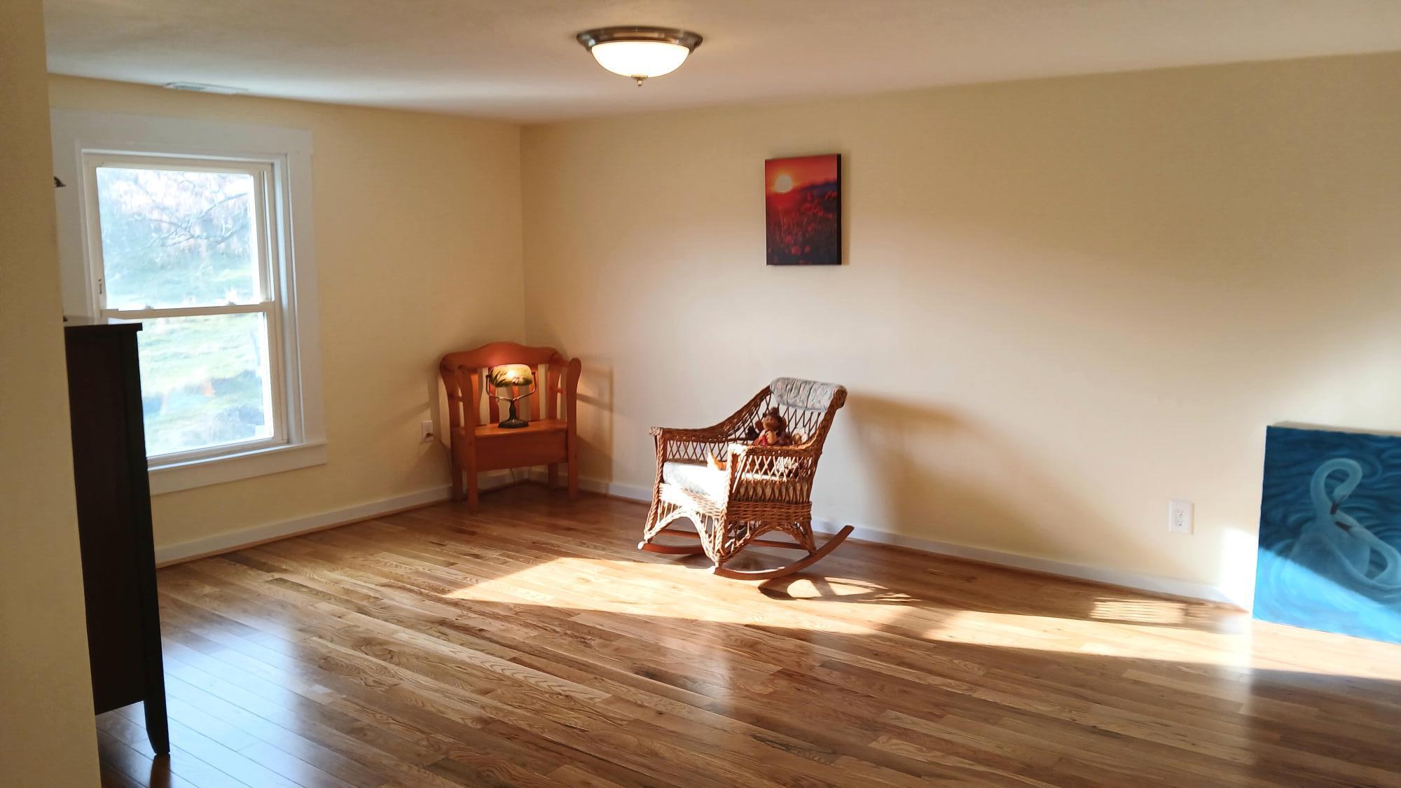 5110 Rich Patch Road Covington, VA 24426 - Photo 17 of 25 a view of workspace with wooden floor and windows