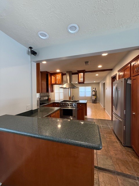 923 West 41st Street Houston, TX 77018 - Photo 4 of 13 a kitchen with stainless steel appliances granite countertop a sink refrigerator and a stove