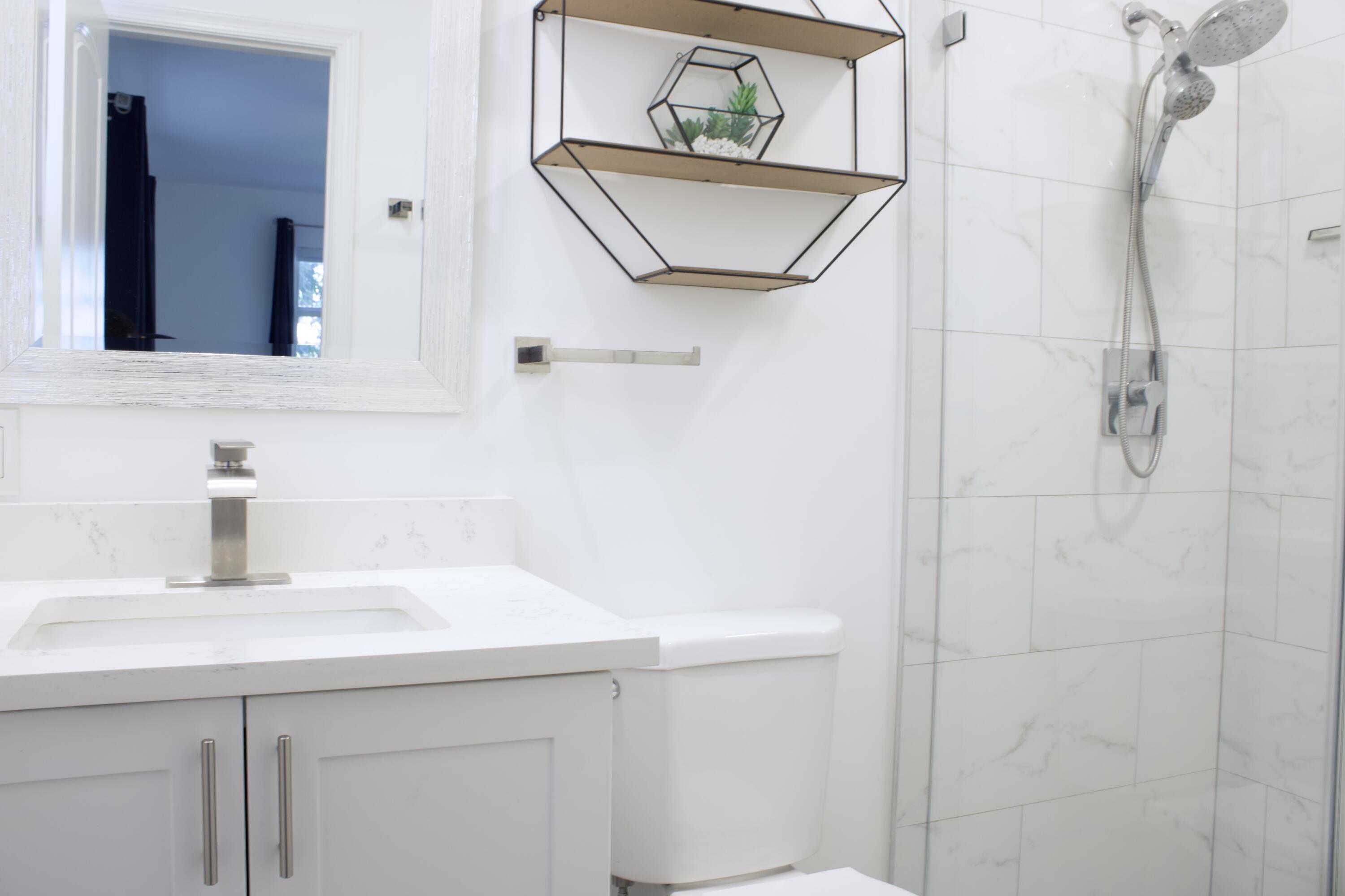 517 Northwest 52nd Street Boca Raton, FL 33487 - Photo 11 of 18 Primary bathroom.