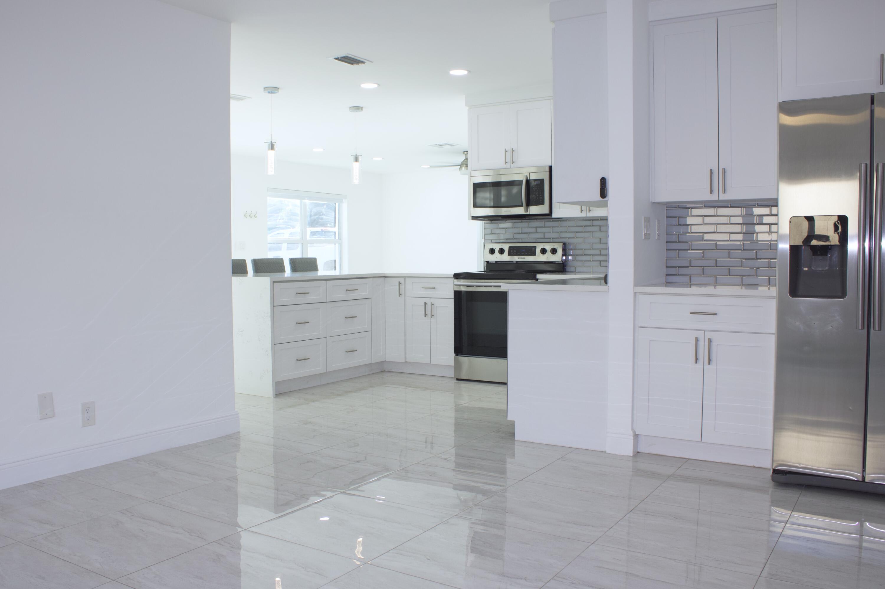 517 Northwest 52nd Street Boca Raton, FL 33487 - Photo 6 of 18 Kitchen.