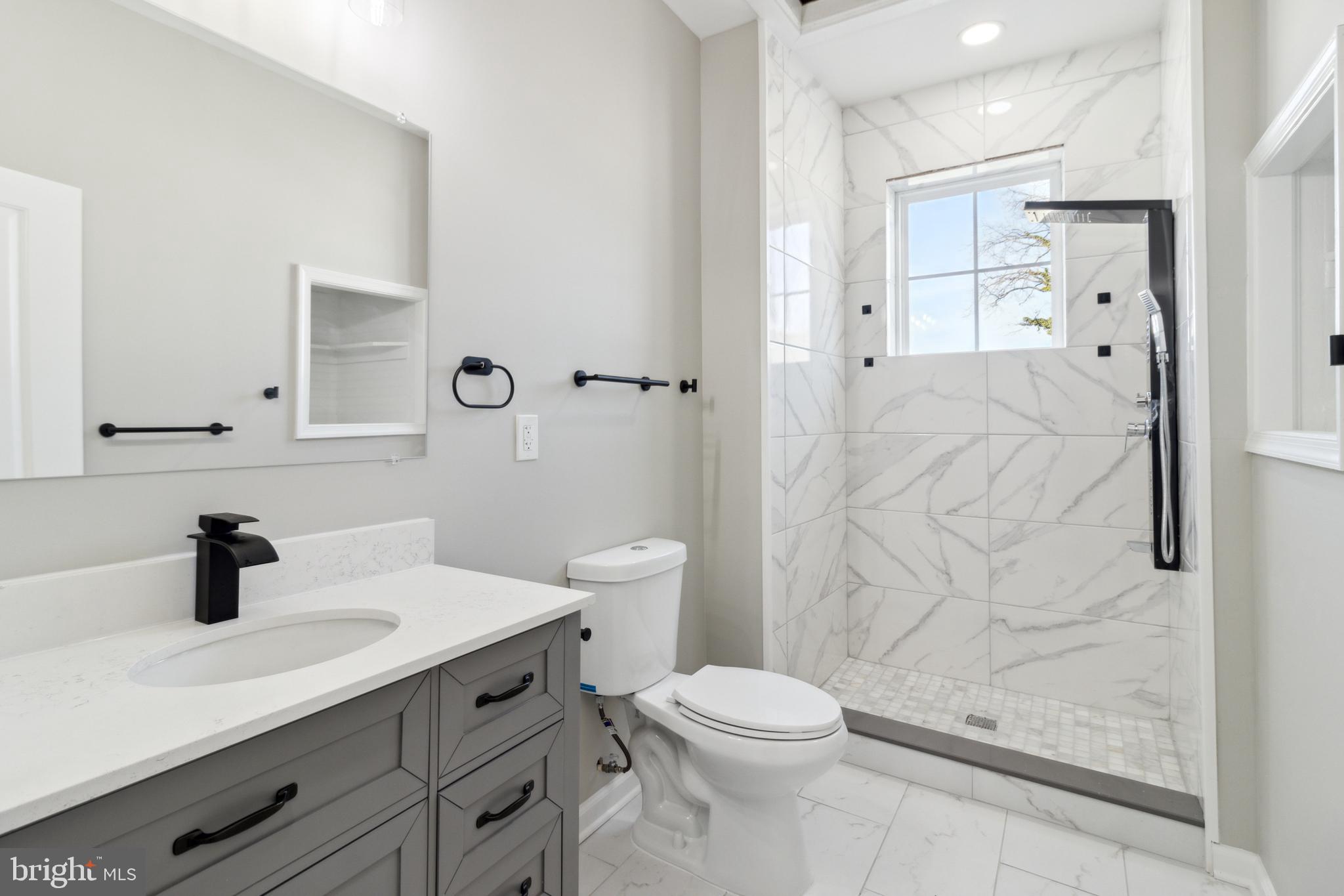 4033 Park Heights Avenue Baltimore, MD 21215 - Photo 27 of 41 Upper Level Hallway Bathroom