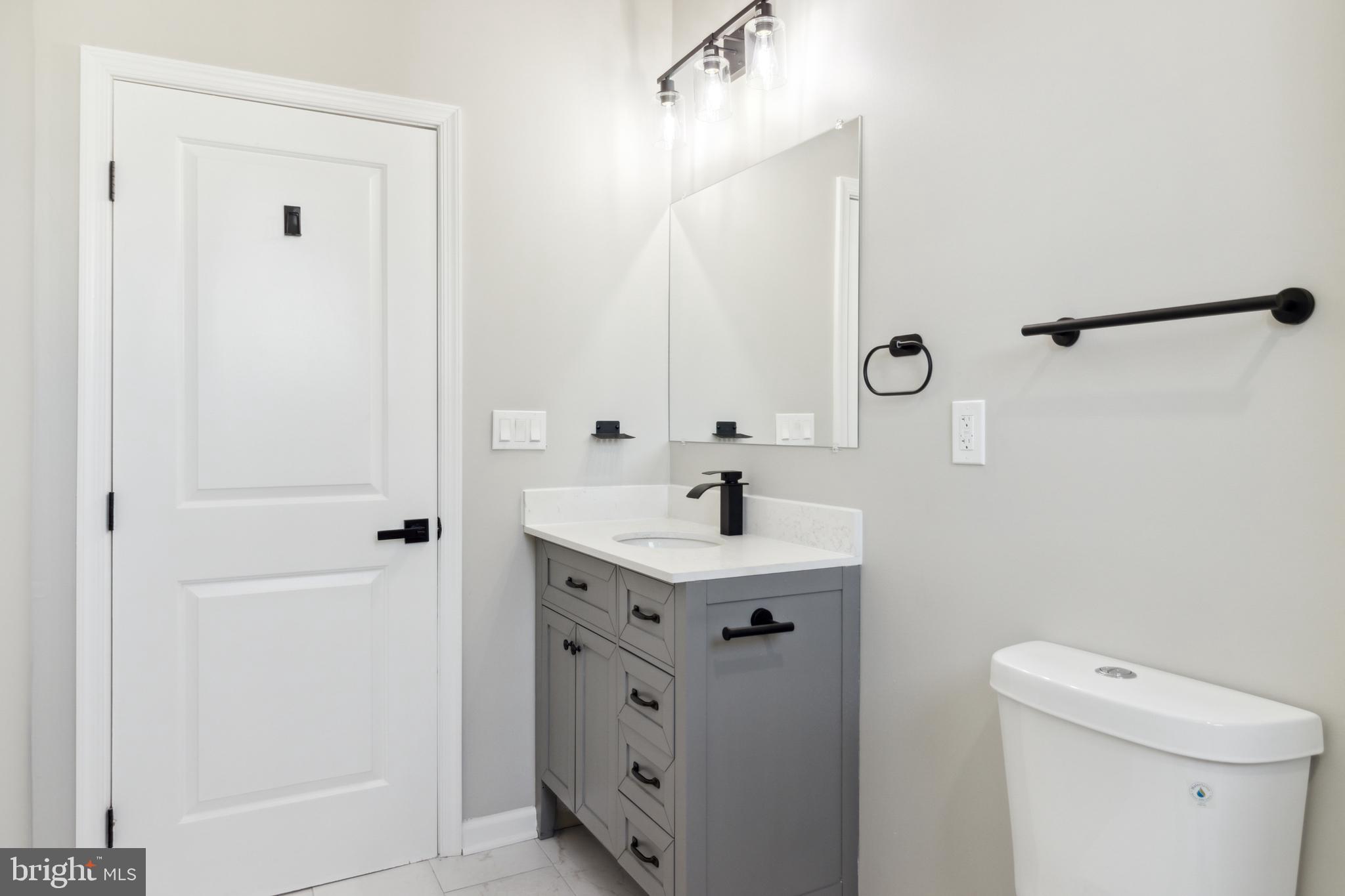 4033 Park Heights Avenue Baltimore, MD 21215 - Photo 29 of 41 Upper Level Hallway Bathroom