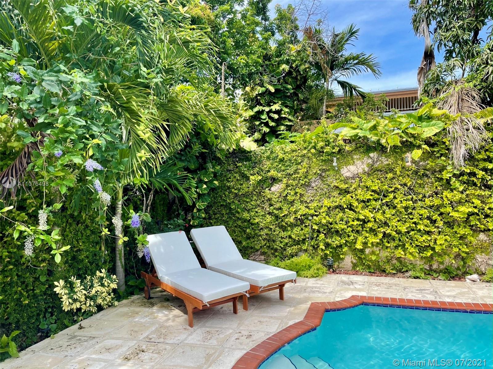 341 Southwest 21st Road Miami, FL 33129 - Photo 11 of 14 a view of a yard with chairs