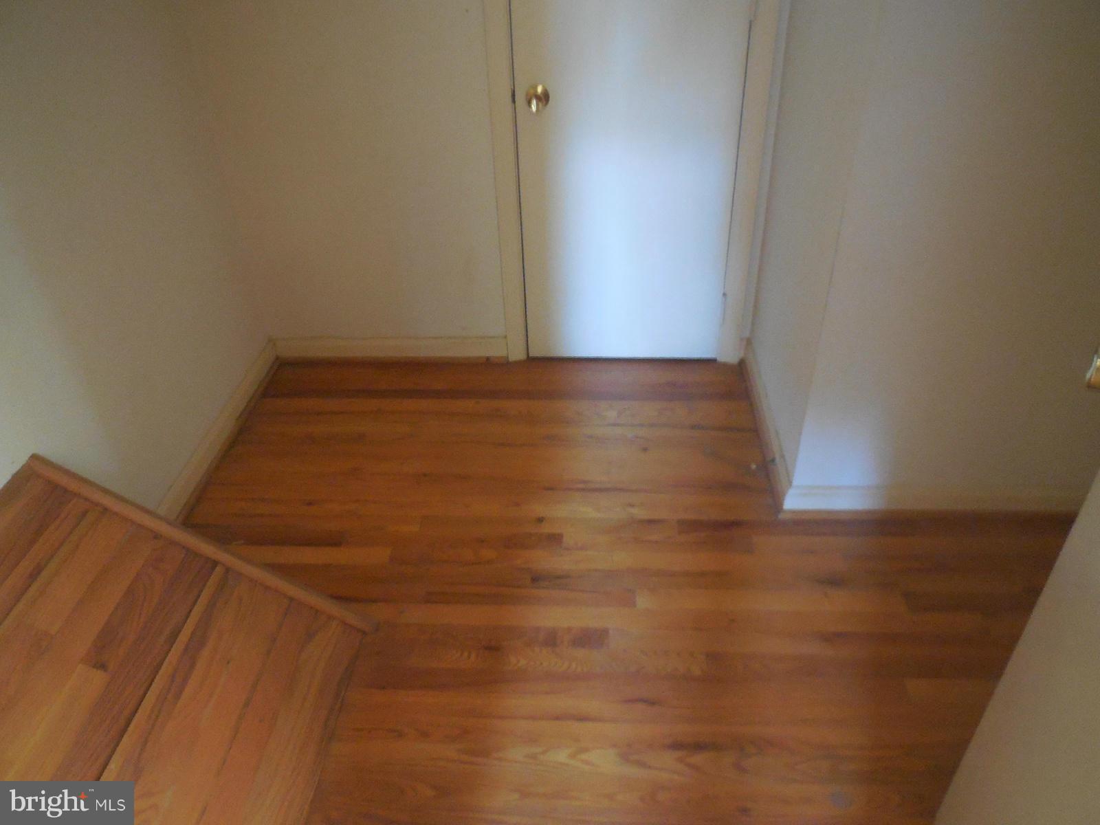 14221 Cantrell Road Silver Spring, MD 20905 - Photo 12 of 16 a view of room with wooden floor