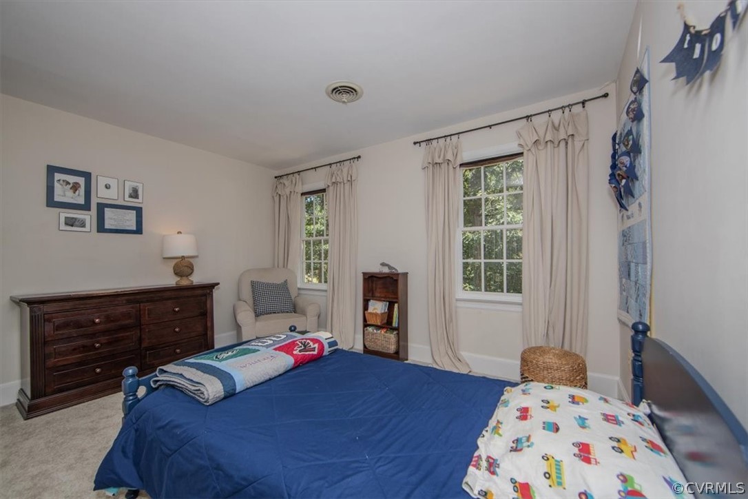 2610 Leafield Terrace Midlothian, VA 23113 - Photo 26 of 40 a bedroom with a bed and wooden floor