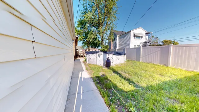 a view of a backyard with plants
