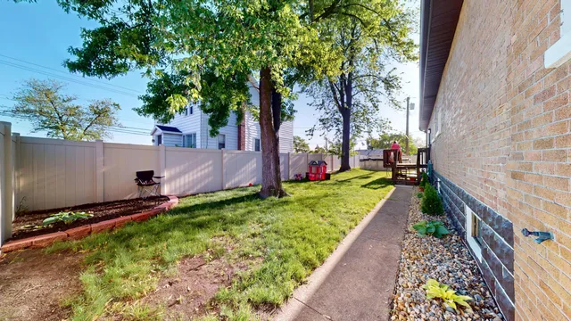 a view of a backyard with a garden