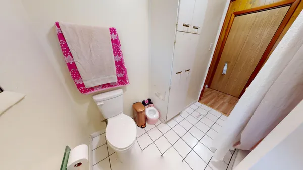a white bath tub sitting next to a white sink
