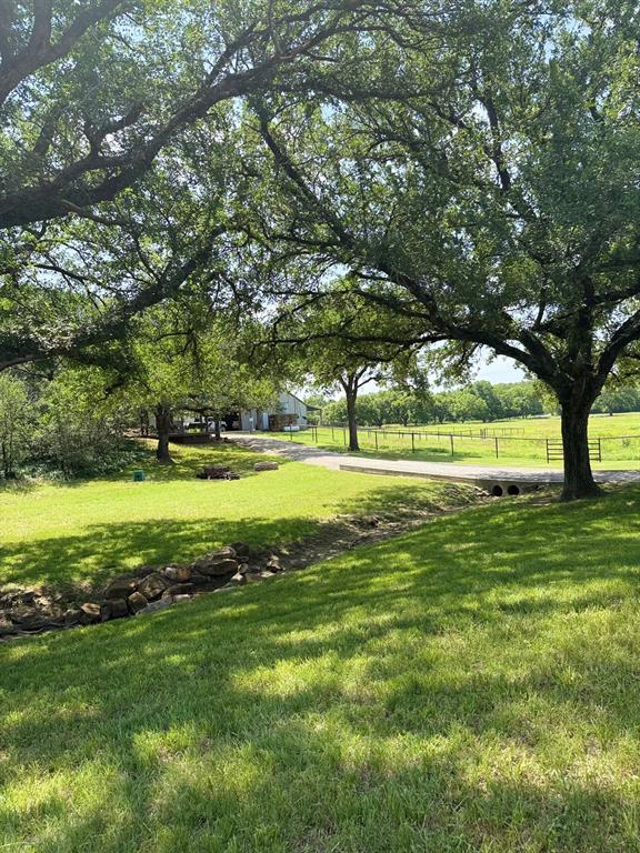 1079 Union Hill Road Mineral Wells, TX 76067 - Photo 12 of 40 a view of a park with large trees