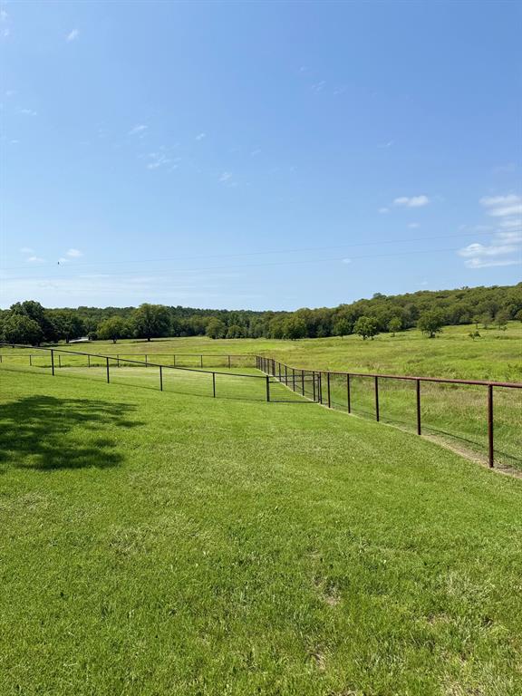 1079 Union Hill Road Mineral Wells, TX 76067 - Photo 5 of 40 a view of a golf course with a lake