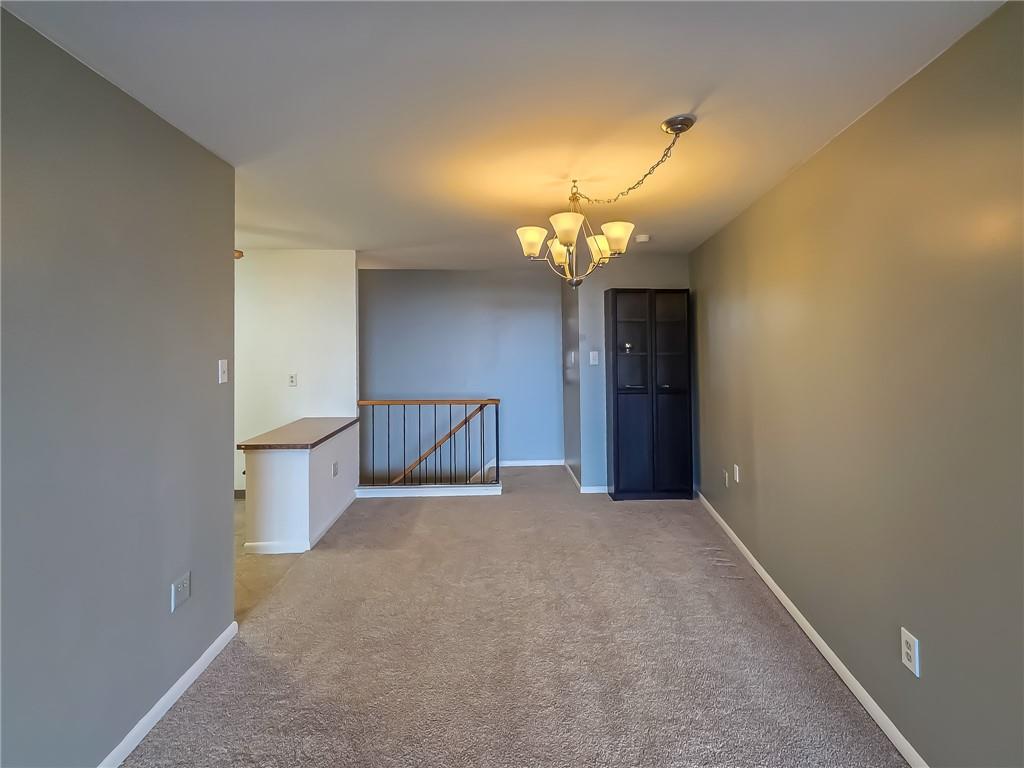 1160 Bower Hill Road, Unit 700C Pittsburgh, PA 15243 - Photo 16 of 35 wooden floor in an empty room with a mirror