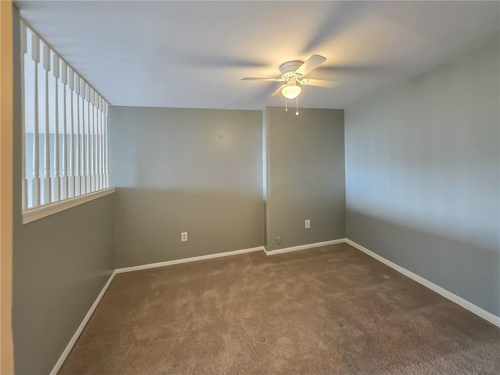 1160 Bower Hill Road, Unit 700C Pittsburgh, PA 15243 - Photo 21 of 35 an empty room with windows and fan