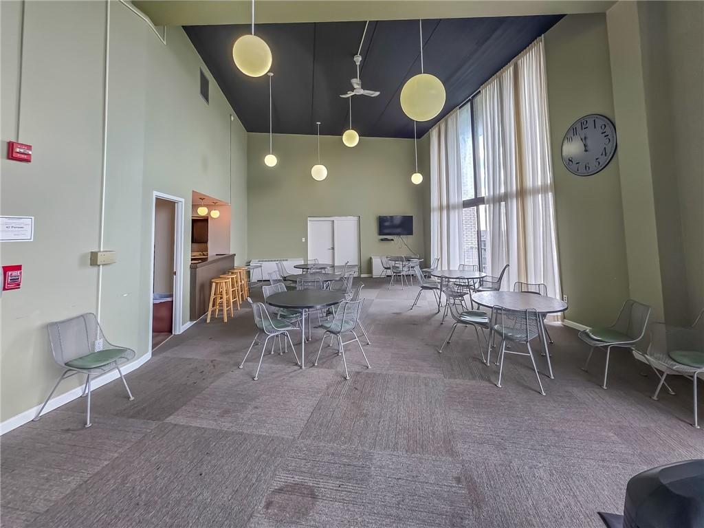1160 Bower Hill Road, Unit 700C Pittsburgh, PA 15243 - Photo 28 of 35 a dining room with furniture and a large window