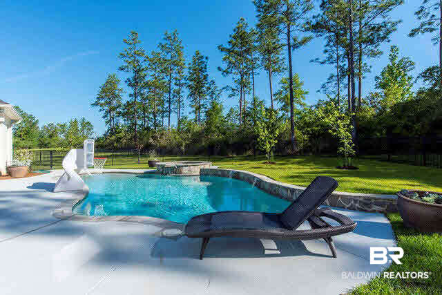 32576 Whimbret Way Daphne, AL 36527 - Photo 5 of 25 Beautiful Stone Surround on Pool that is Ready for Water Volleyball and Basketball Games