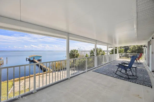a spacious bedroom with a bed dresser and a window