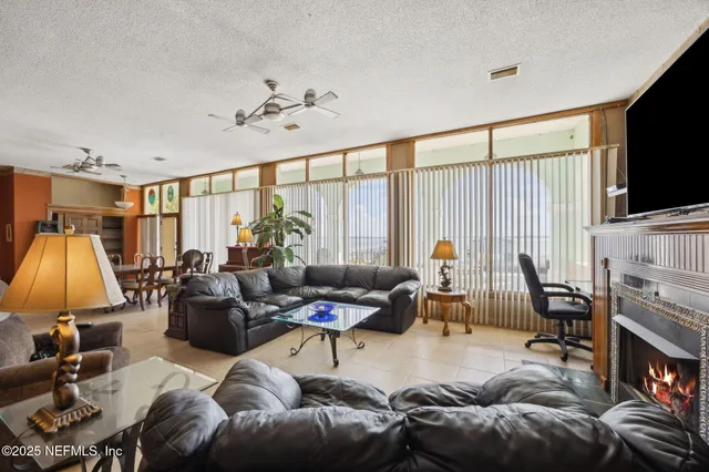 a very nice looking living room with a large window
