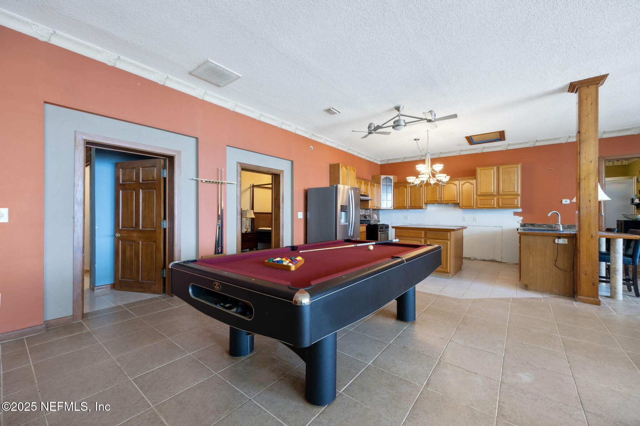 259 South Prospect Street Crescent City, FL 32112 - Photo 32 of 63 a room with pool table and windows