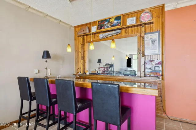 a view of a living room and a wooden floor