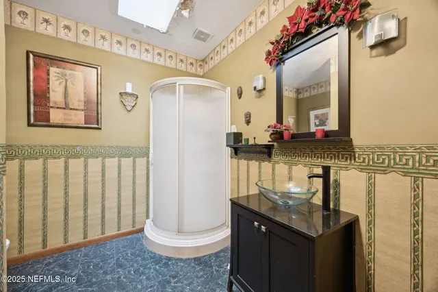 a view of a balcony with wooden floor