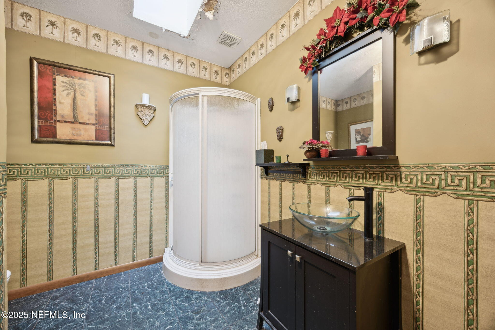 259 South Prospect Street Crescent City, FL 32112 - Photo 39 of 63 a bathroom with a granite countertop sink and a mirror