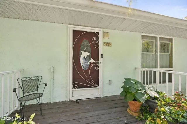 a picture of a room with a white wall and white walls