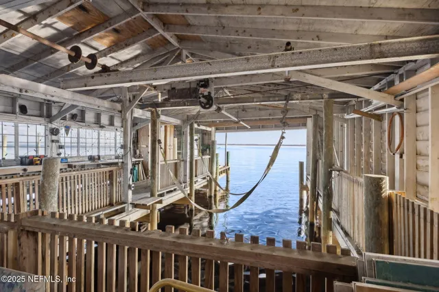 a view of swimming pool with a yard