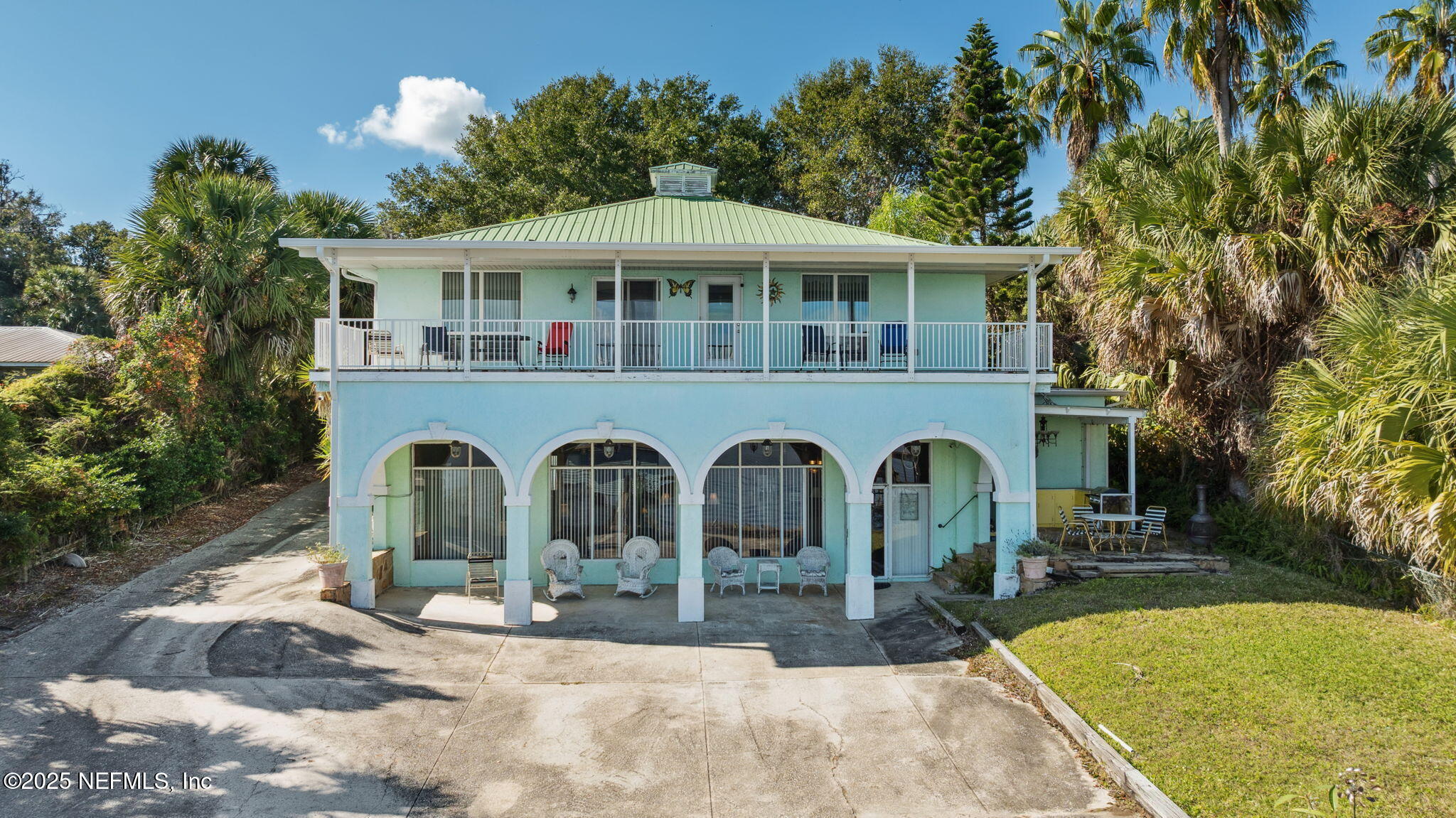 259 South Prospect Street Crescent City, FL 32112 - Photo 57 of 63 a front view of a house with yard and trees around