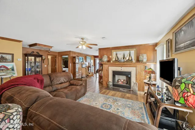 a kitchen with stainless steel appliances granite countertop a stove and a refrigerator
