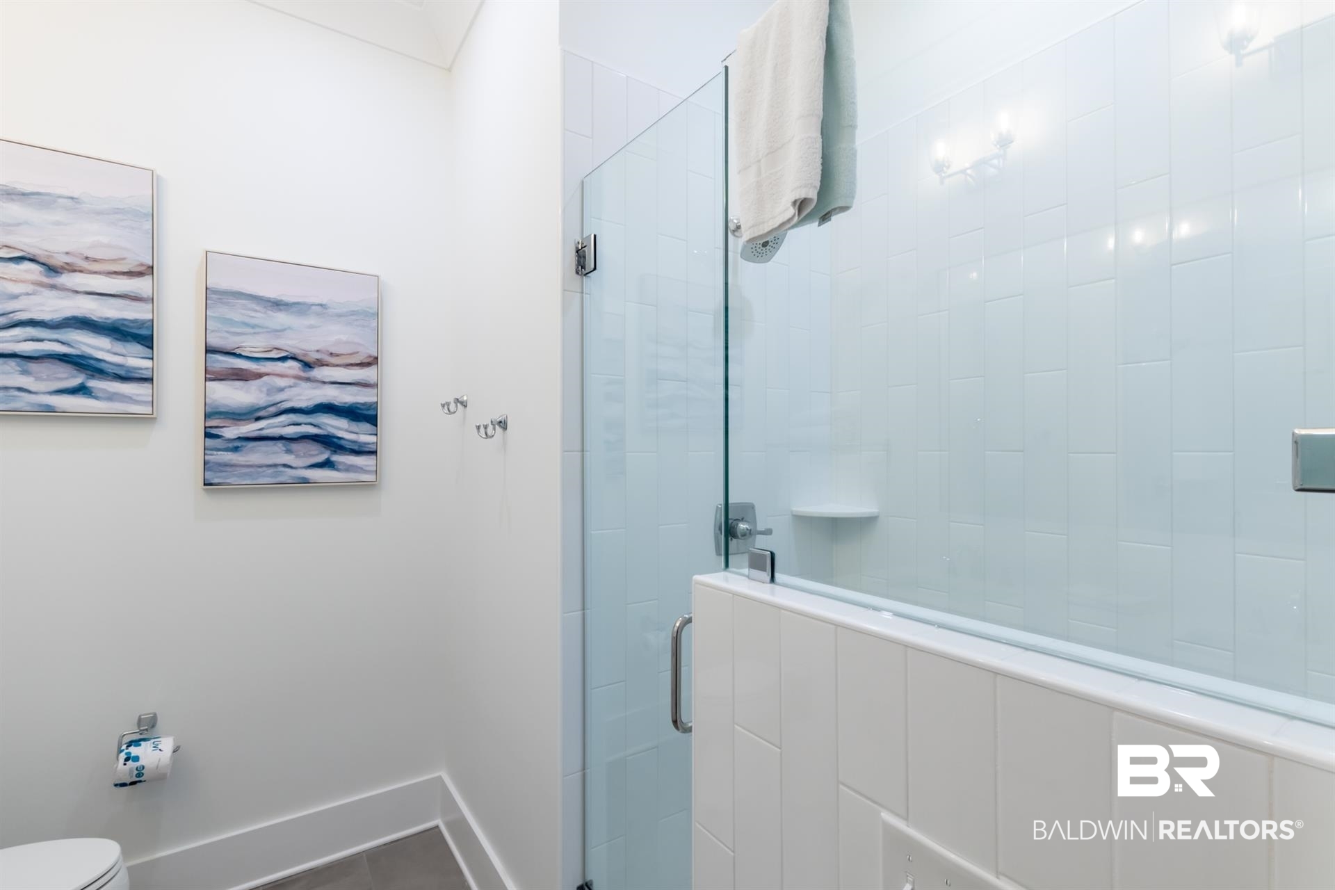 2494 Saltgrass Way Orange Beach, AL 36561 - Photo 16 of 37 Bathroom featuring toilet and a shower with shower door