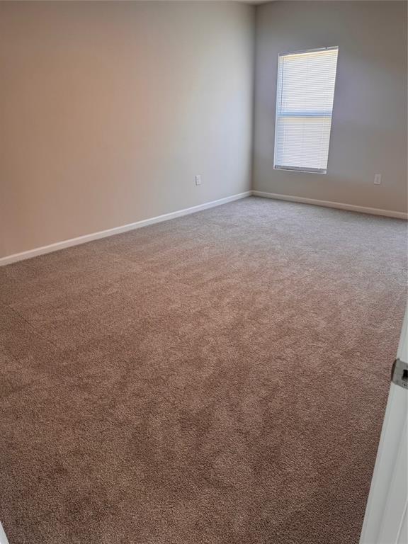 347 Biltmore Boulevard Dundee, FL 33838 - Photo 11 of 18 an empty room with windows