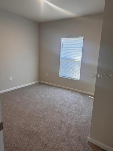 347 Biltmore Boulevard Dundee, FL 33838 - Photo 9 of 18 an empty room with a window