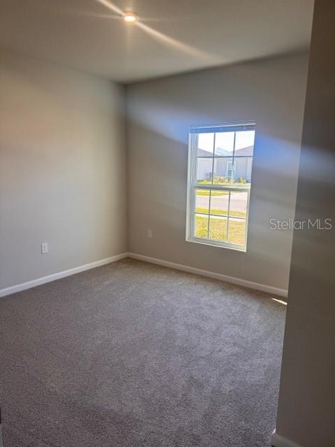 347 Biltmore Boulevard Dundee, FL 33838 - Photo 10 of 18 an empty room with a window
