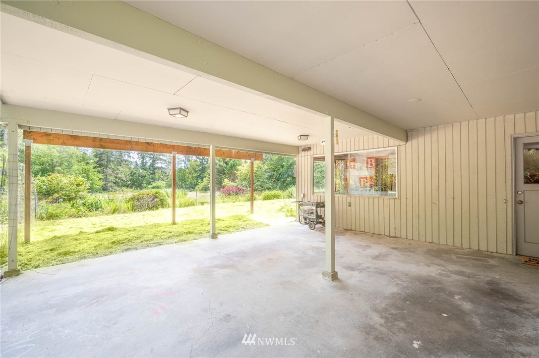 21429 Monument Road Southwest Vashon, WA 98070 - Photo 14 of 37 a view of empty room with floor to ceiling window