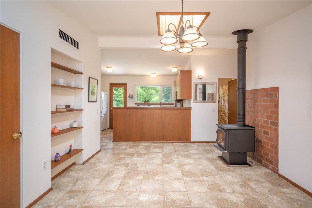 21429 Monument Road Southwest Vashon, WA 98070 - Photo 25 of 37 a view of a room with a kitchen