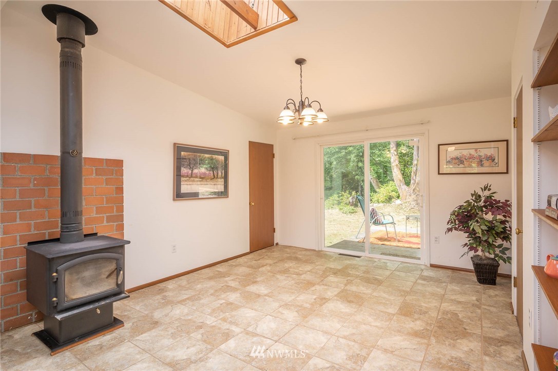 21429 Monument Road Southwest Vashon, WA 98070 - Photo 27 of 37 a view of an empty room with a window